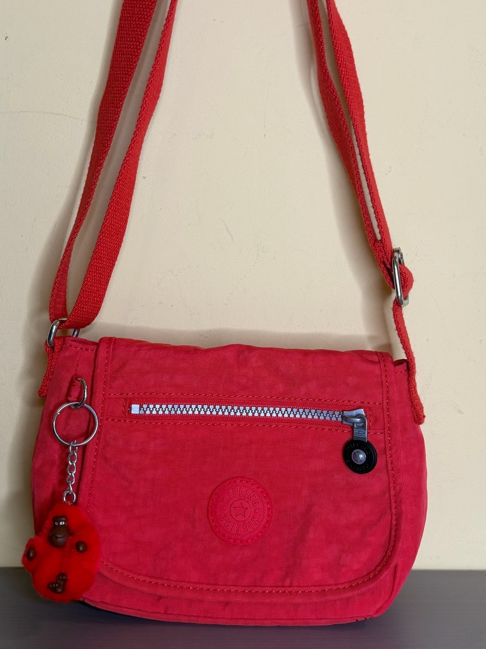 Kipling Sabian mini Red Crossbody Shoulder Bag with red fuzzy monkey keychain